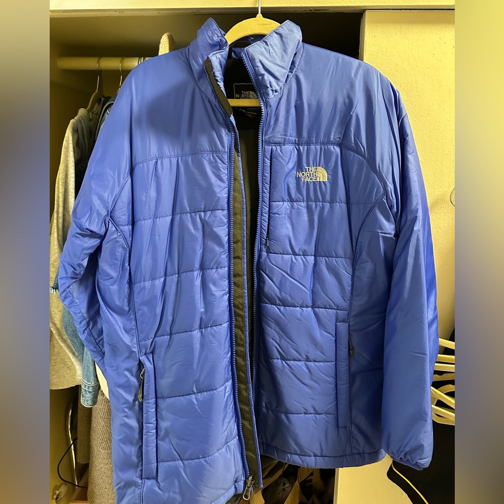 Blue north face puffer jacket
